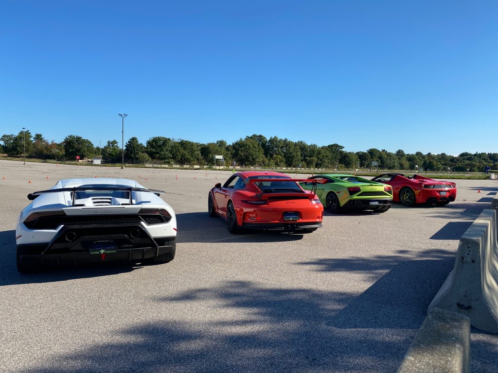 line of exotic sports cars at xfinity center